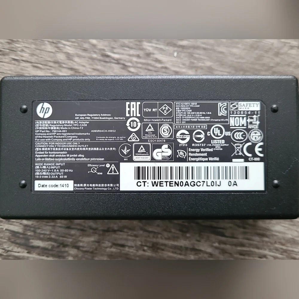 Preowned OEM HP 65W AC Adapter 710412-001 - 4.5mm x 3.0mm Black Tip Charger